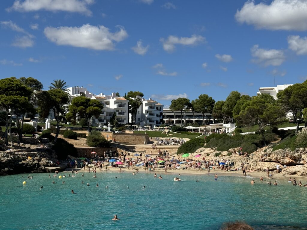 View from a boat of a busy beach.