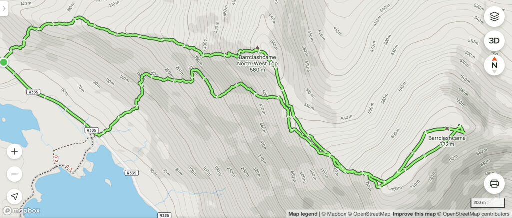Topographic route map showing the out-and-back trail taken when climbing Barrclashcame in the Sheeffry Mountains, Co. Mayo. The path begins near the Doolough Famine Memorial, ascends past Barrclashcame North West Top (580m), and continues to the summit of Barrclashcame (772m), with contour lines highlighting the steep and rugged terrain.