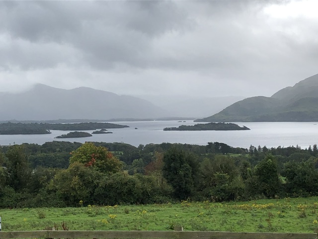 View over the Lakes of Killarney with low cloud and mountain scenery in the distance