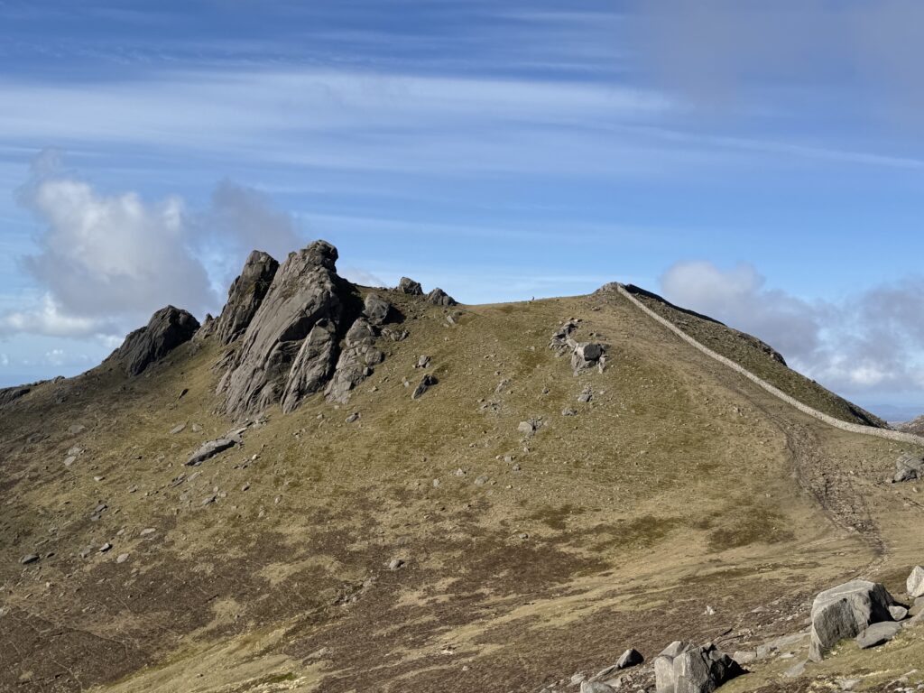 The granite tors and summit ridge on the Slieve Bearnagh Hike in the Mourne Mountains.