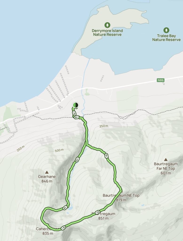Route map of the mountain hike from Derrymore Glen to Caherconree and Baurtregaum, with the trail looping back towards the starting point near the N86 in County Kerry.